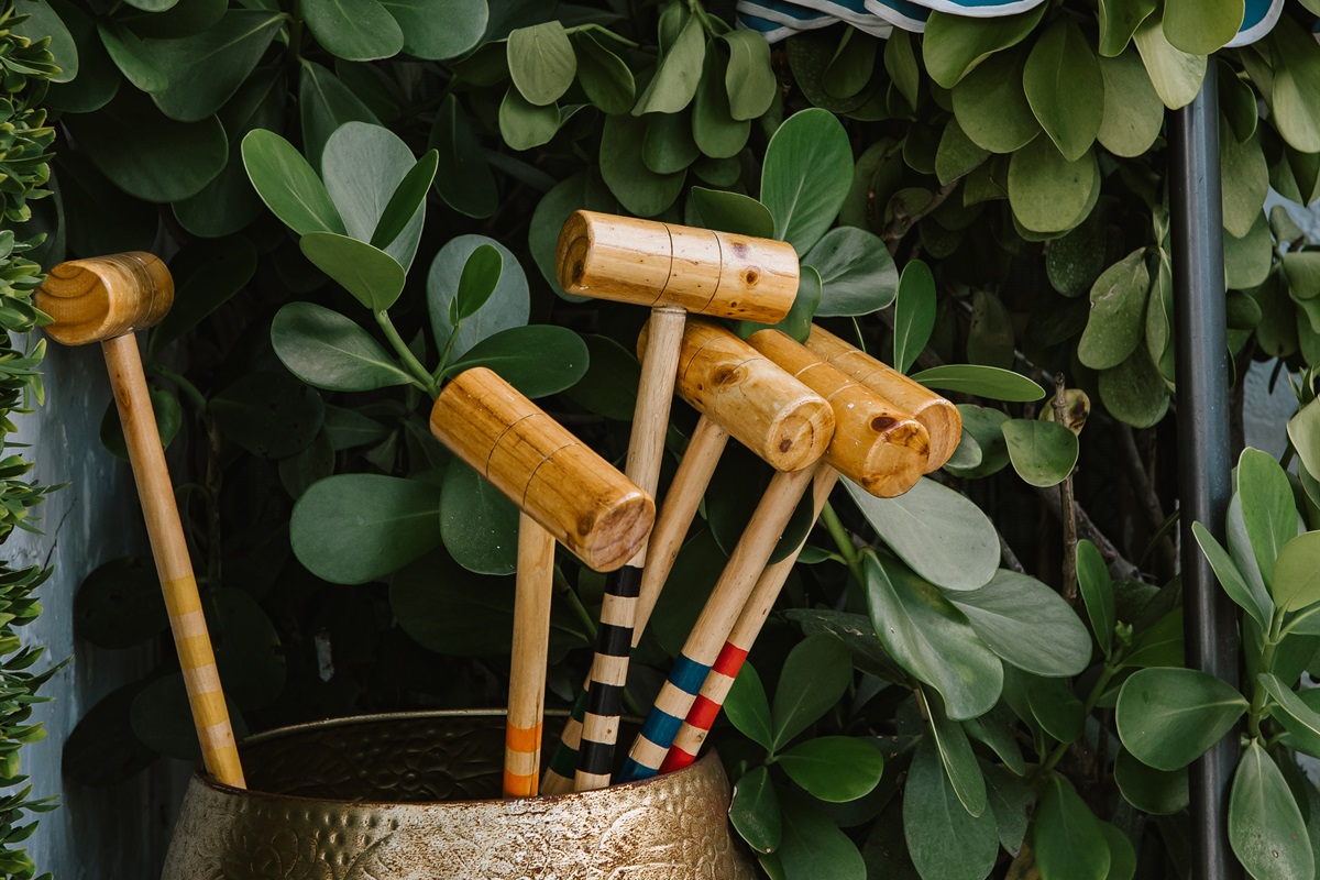 Games of croquet await in the spacious lawn area.