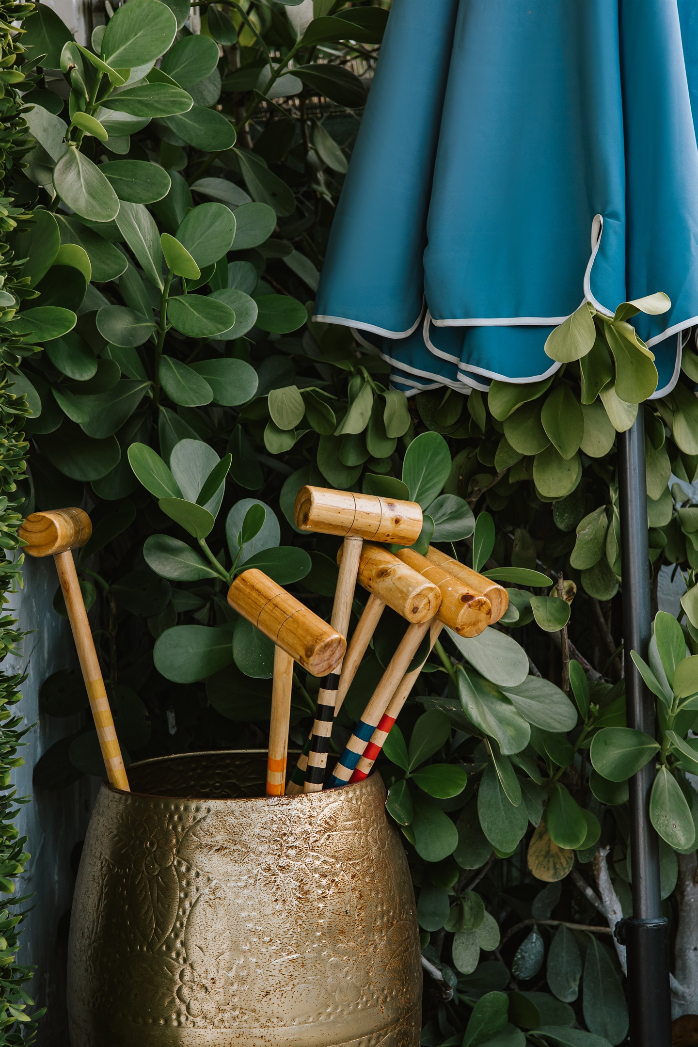 Games of croquet await in the spacious lawn area.