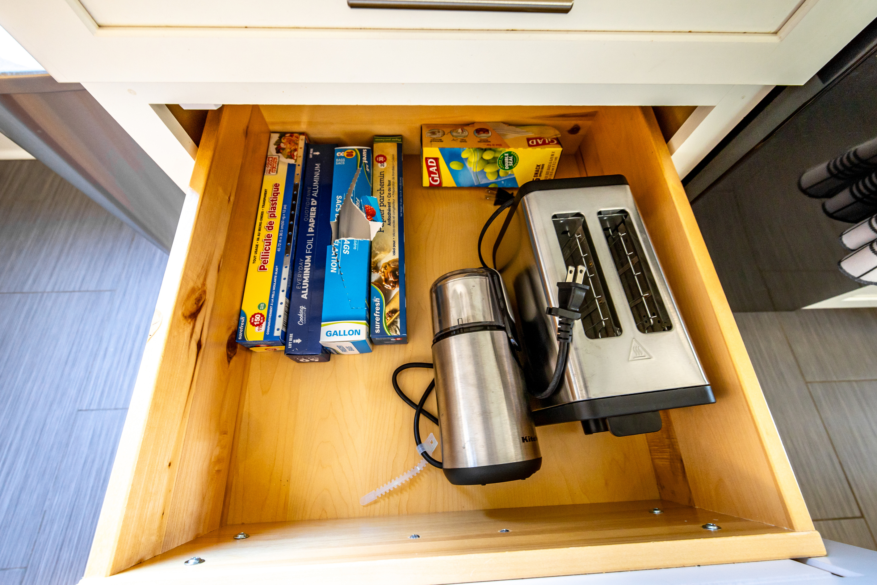 Fully equipped kitchen with refrigerator, stove, oven, microwave, dish washer.