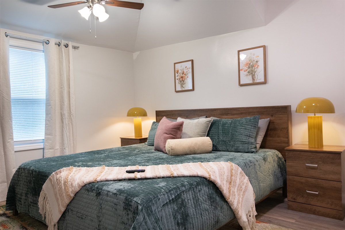 Rest easy in this bright & cozy bedroom retreat. Book your stay and wake up refreshed!