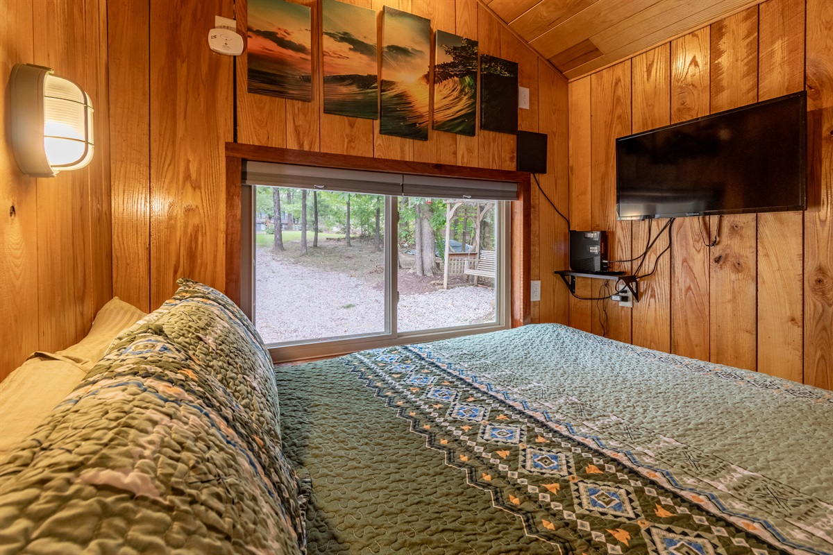 Bedroom offering both storage and an office nook.