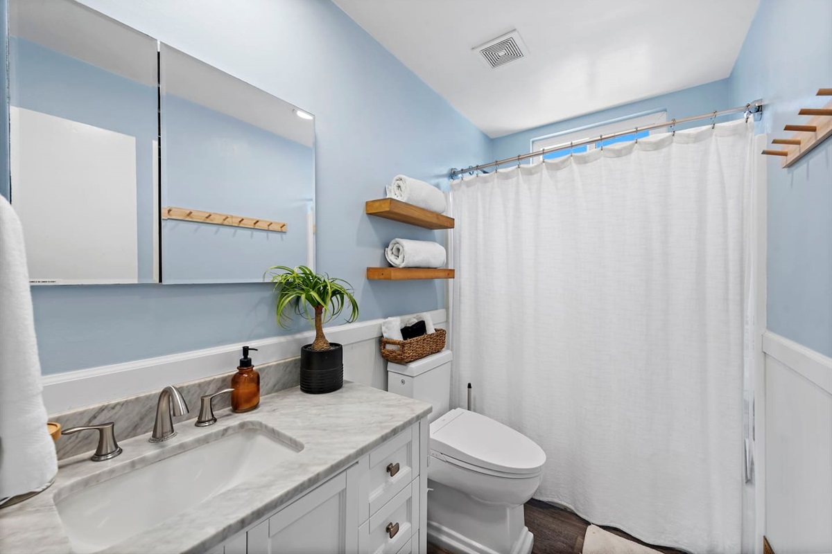 Our fresh and clean bathroom is fully equipped with soap, shampoo, and conditioner.  The building has a water softener so the shower feels luxurious.  There is also an outdoor shower for use after the beach.