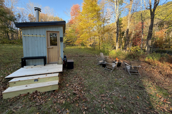 Enjoy the firepit while you wait for the sauna to warm up. Takes about 30 minutes. Big stove. Small space. 