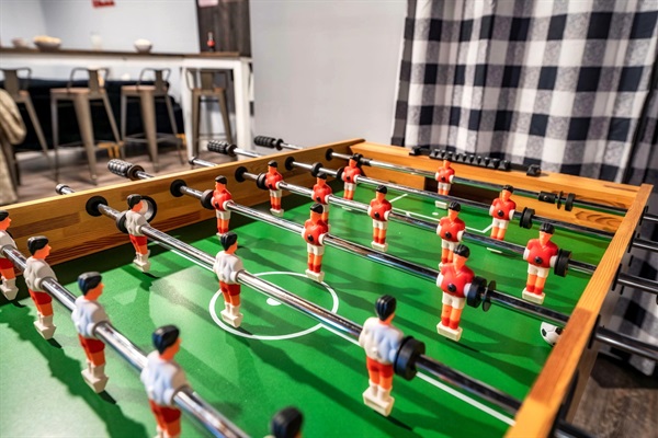 This is one of many perks that we offer at our cabin. How about enjoying a game of Foosball with friends and family during your stay?