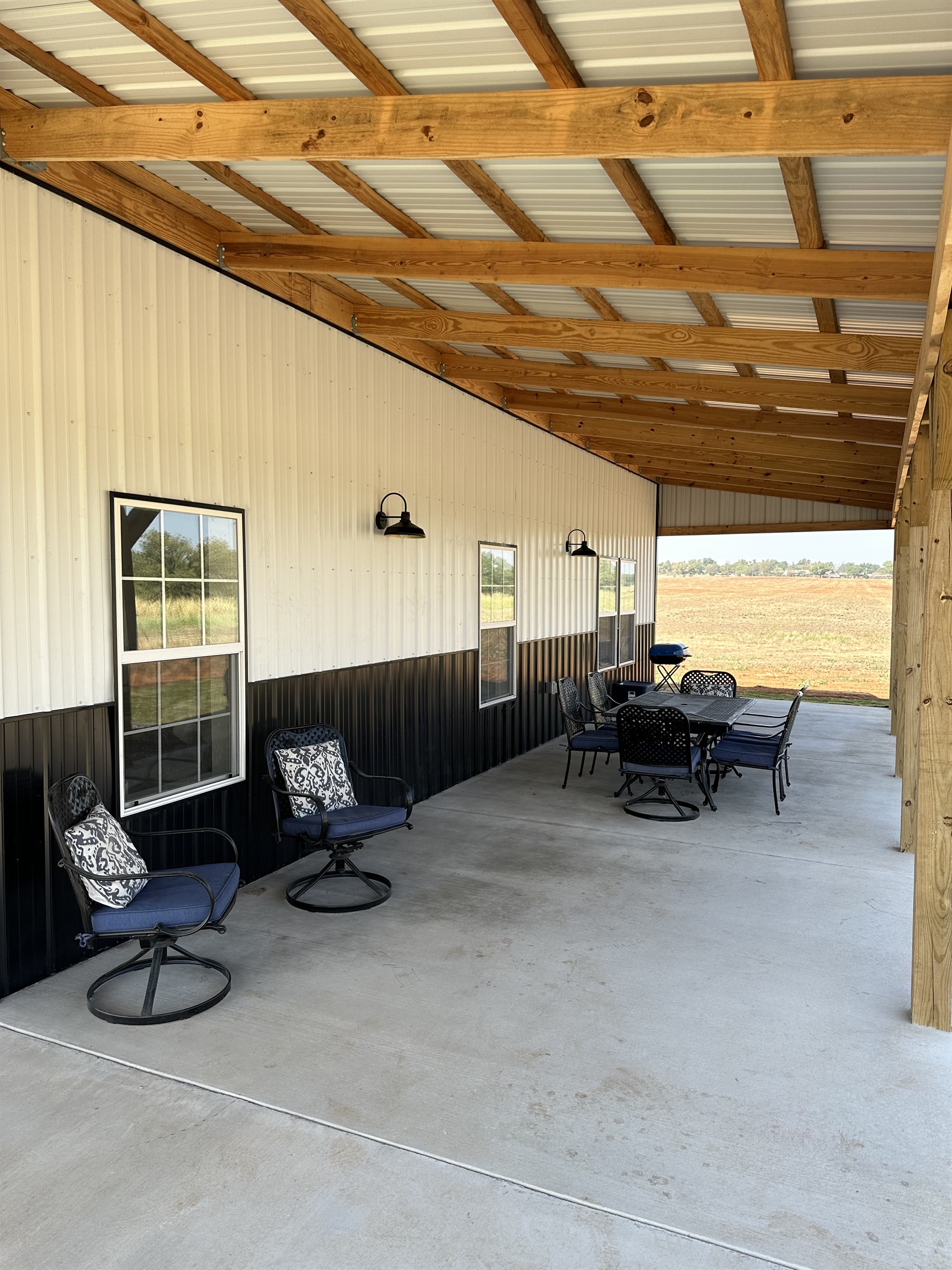 Massive wrap around porch with outdoor furniture