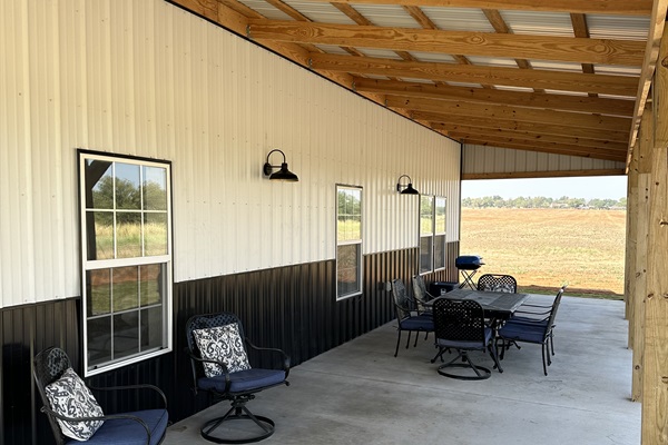 Massive wrap around porch with outdoor furniture