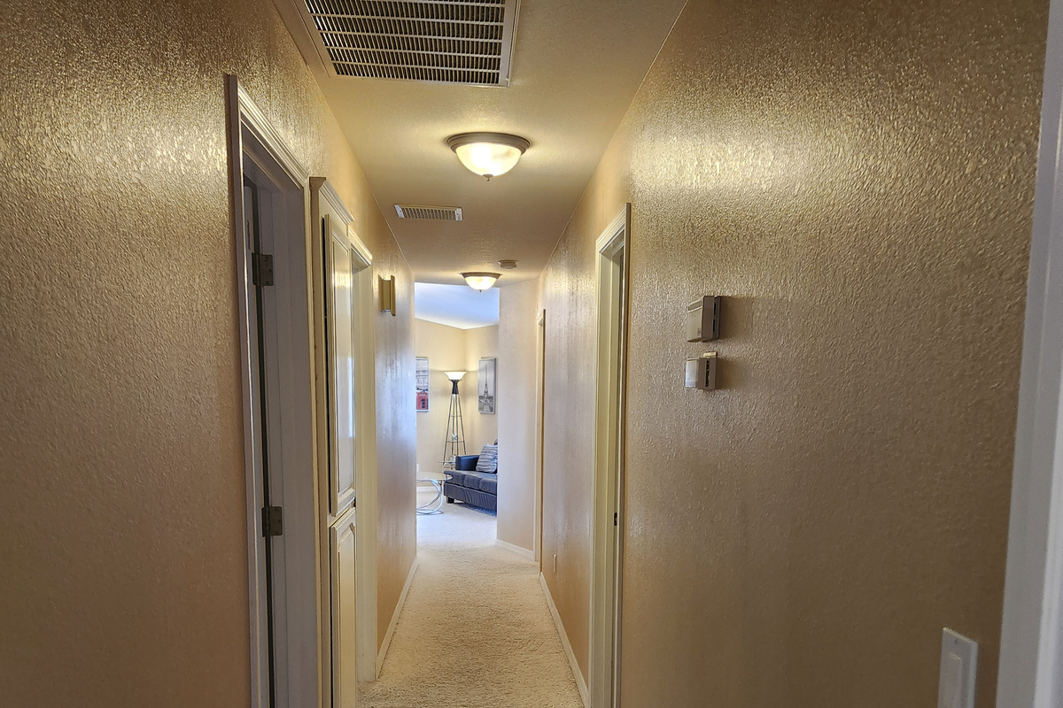 Hallway to every room and guest bathroom