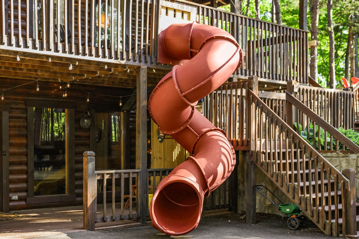 This 10ft twist slide is a hit with the kids! It also has a gate at the top for when playtime is over.
