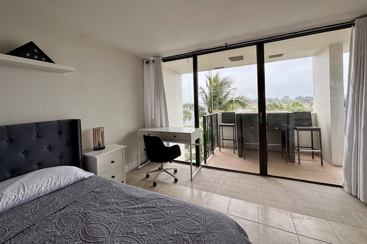 The bedroom also features a conveniently located workspace, where great views of the lake can be had.