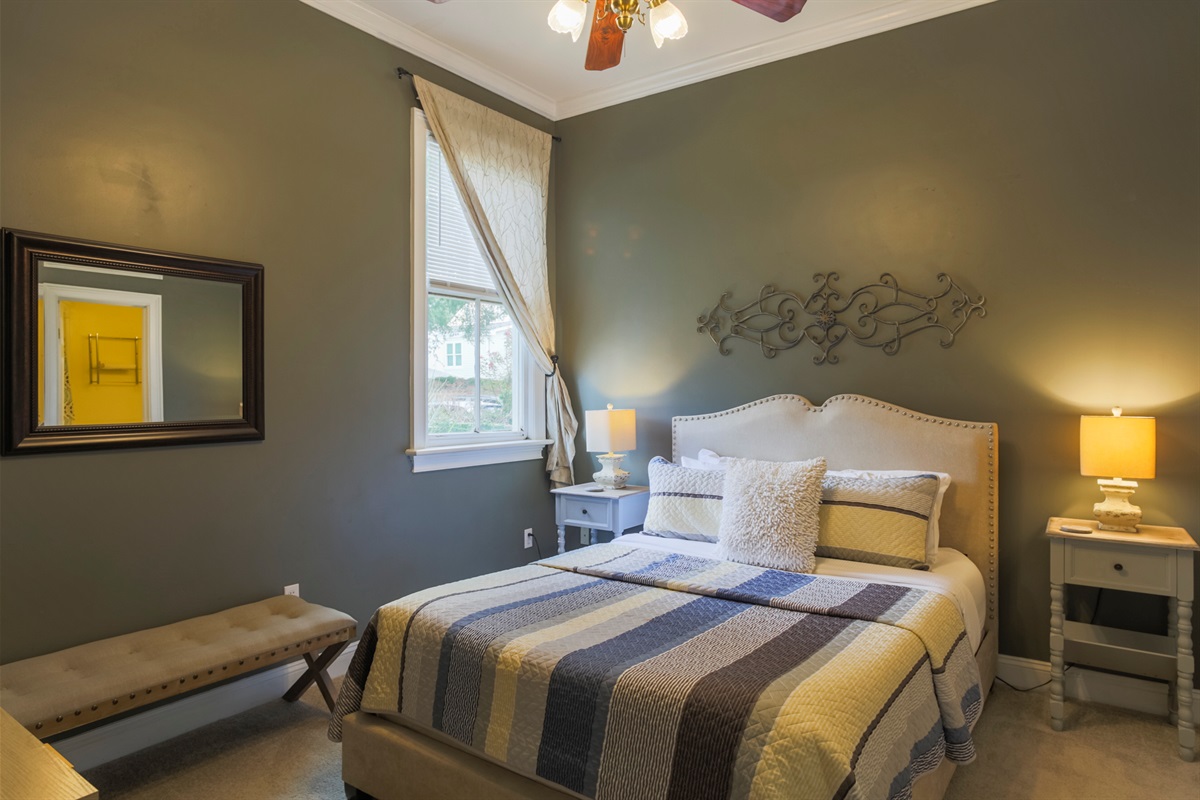 Relax in style with a plush queen bed and thoughtfully chosen décor.