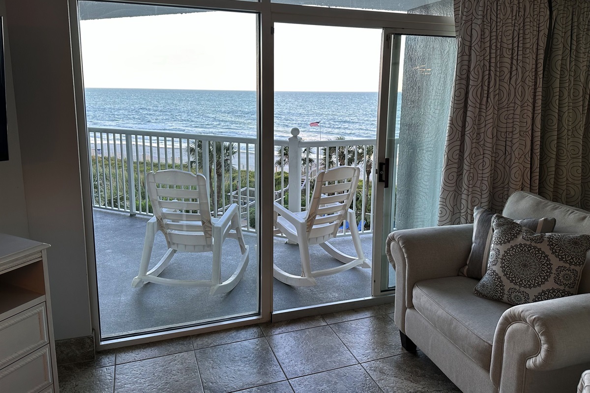 Enjoy rocking on our large ocean front balcony.