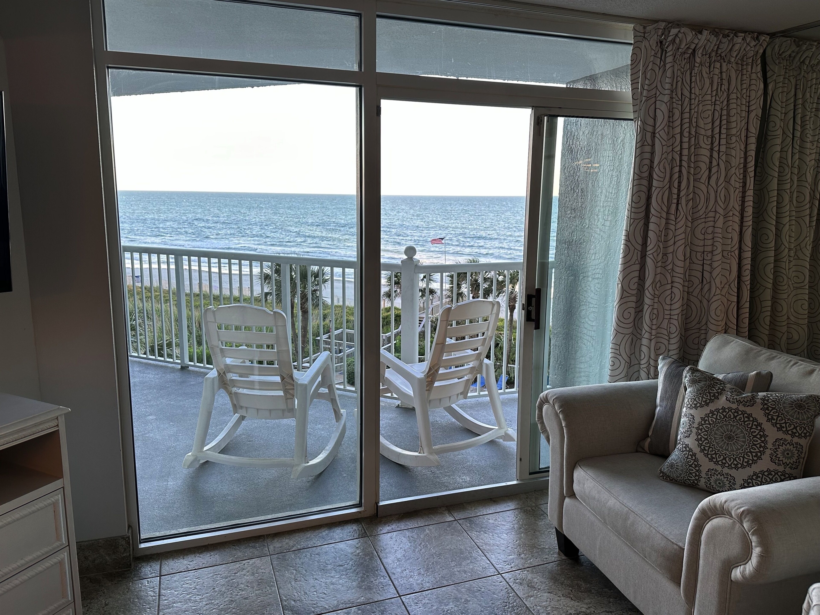 Enjoy rocking on our large ocean front balcony.