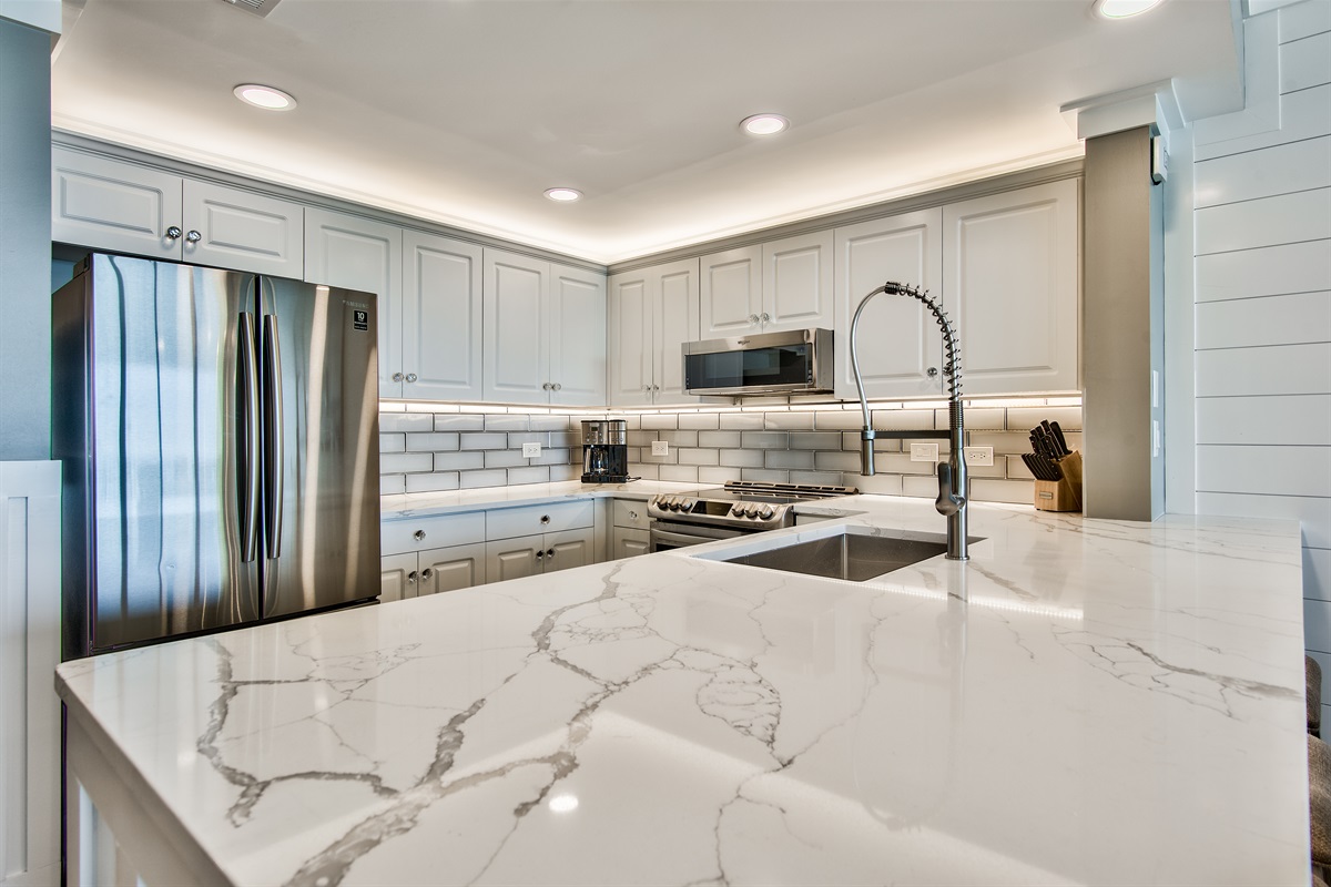 Kitchen with quartz counter tops and stainless steel appliances