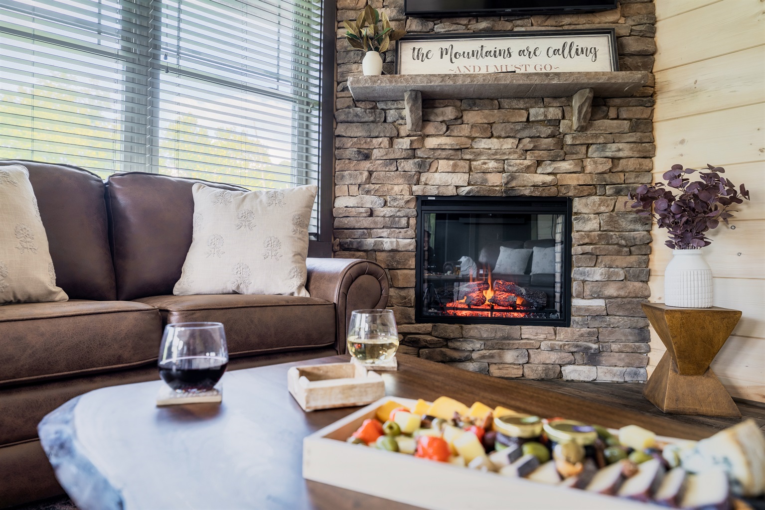 Warm up by the electric fireplace.