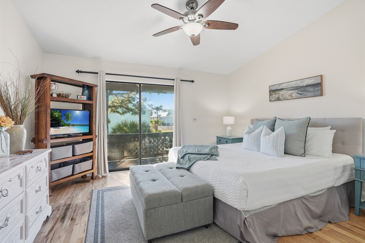 Bedroom #1 with King Bed and Balcony Access Overlooking the Back Yard