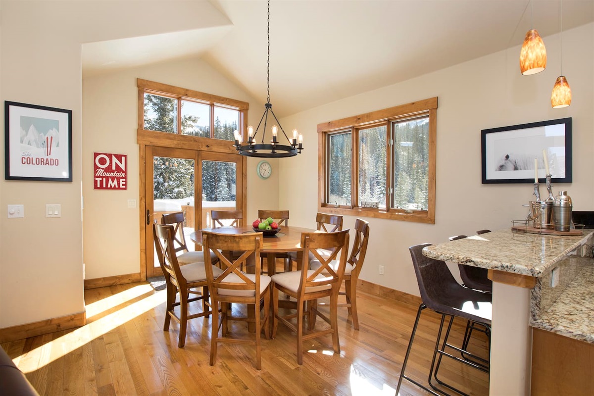 Dining Room off Kitchen with sliding glass door to access balcony