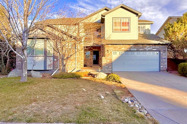 Inviting front view of the house, showcasing its charming exterior and welcoming atmosphere