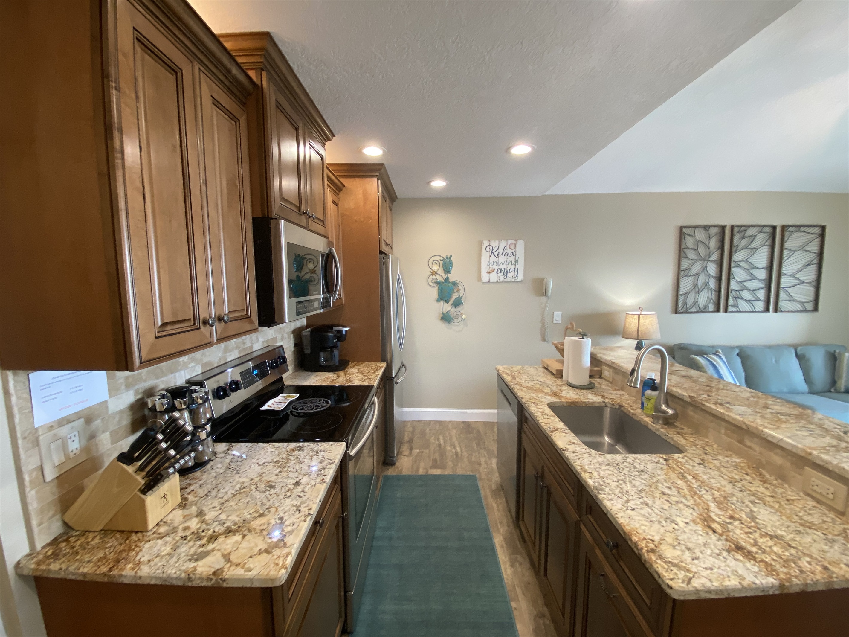Beautifully decorated kitchen with granite countertops.