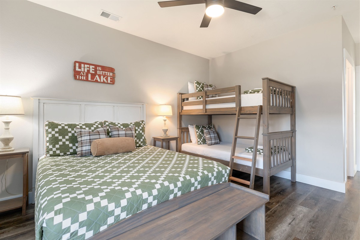 Lower level Queen bedroom w/ bunks and ensuite bath