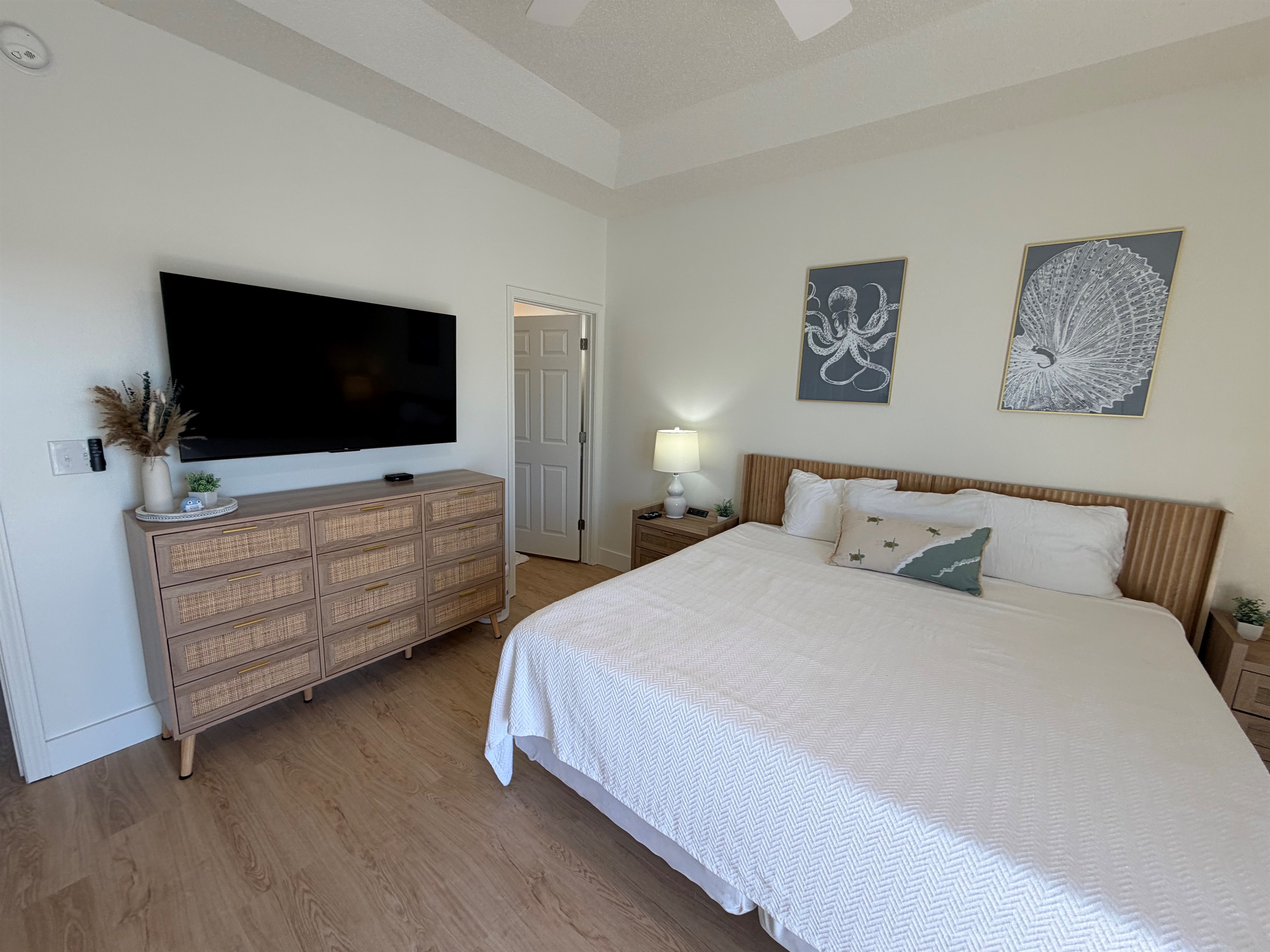 55 inch TV in both bedrooms. Pull TV out to hook up computer or Play Station! 