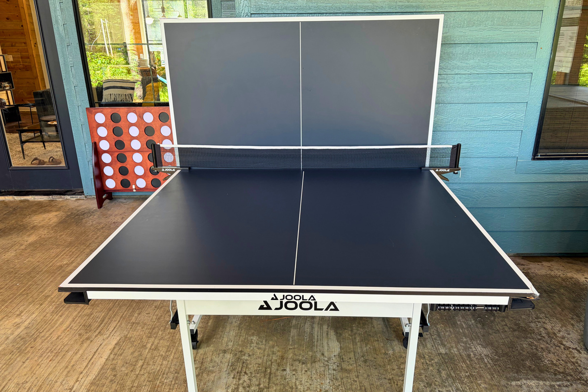 Rain or shine, this covered ping pong table is always ready for a quick match or a competitive showdown.
