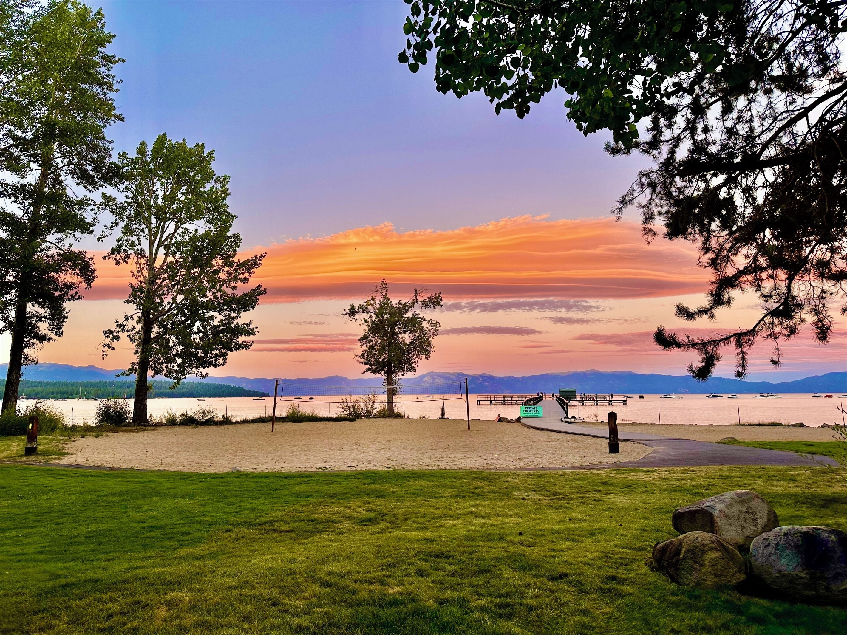 Glorious sunset over the pier and lake as viewed from the house