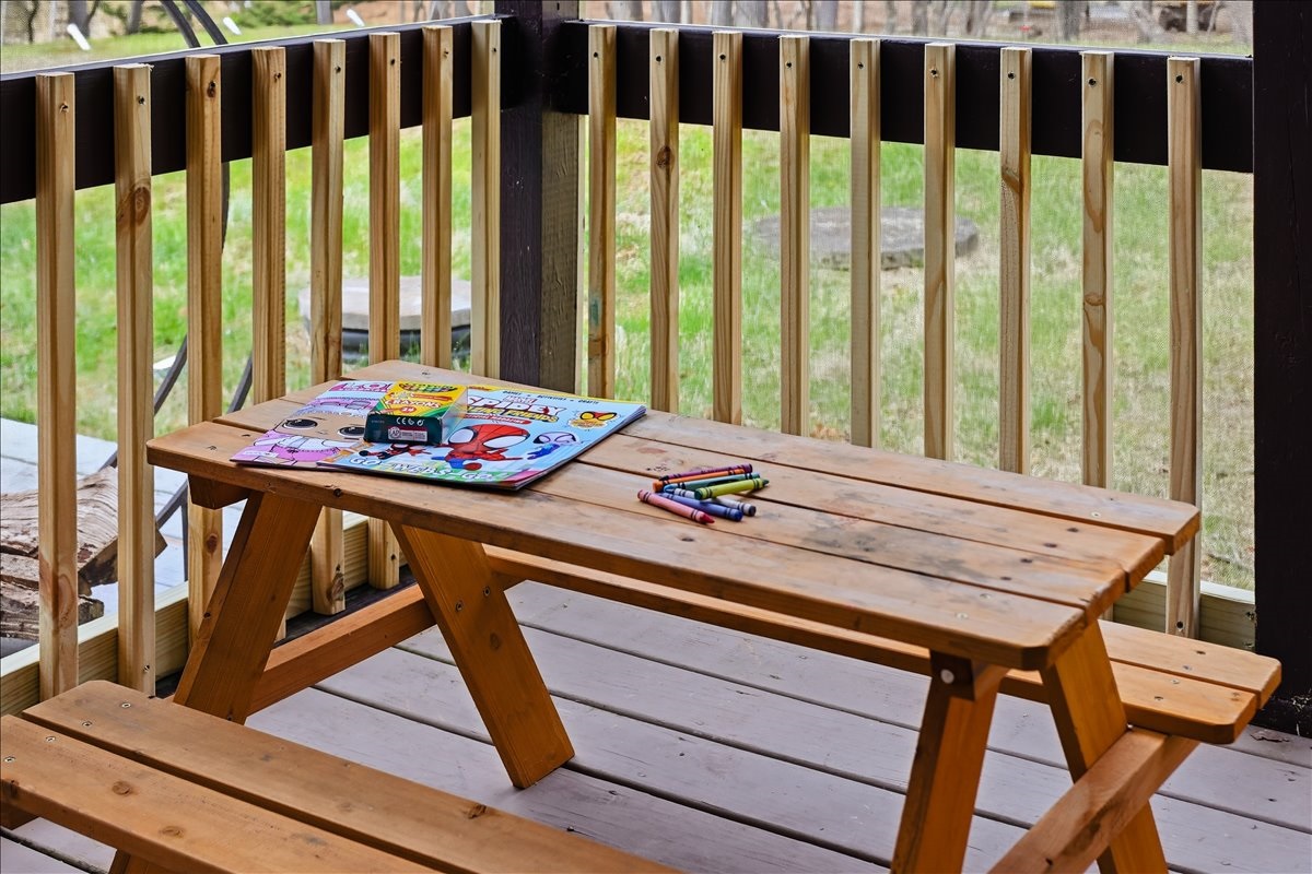 The little ones get their own table on the porch. Kid-sized and perfect for meals, crafts or coloring