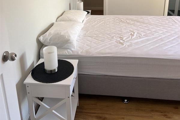 Main bedroom features Queen bed, ensuite & WIR