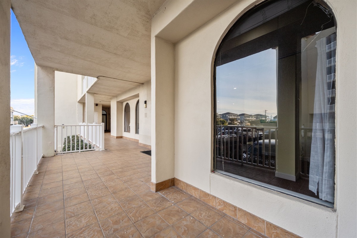 Covered exterior corridor with easy access to the unit and nearby amenities