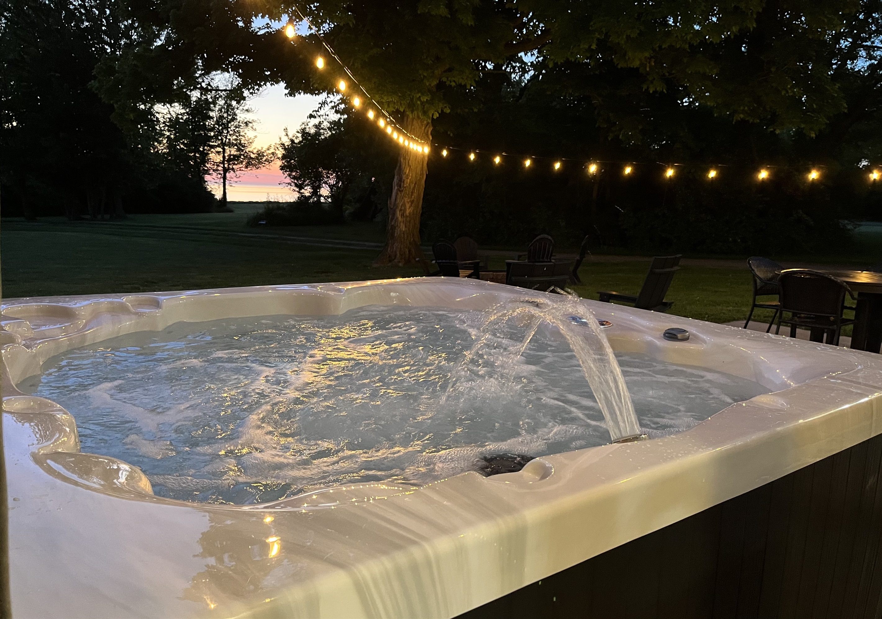 Enhance your evening by witnessing a breathtaking sunset over Lake Michigan while relaxing in the hot tub! It's an unforgettable experience that you will not want to miss! 