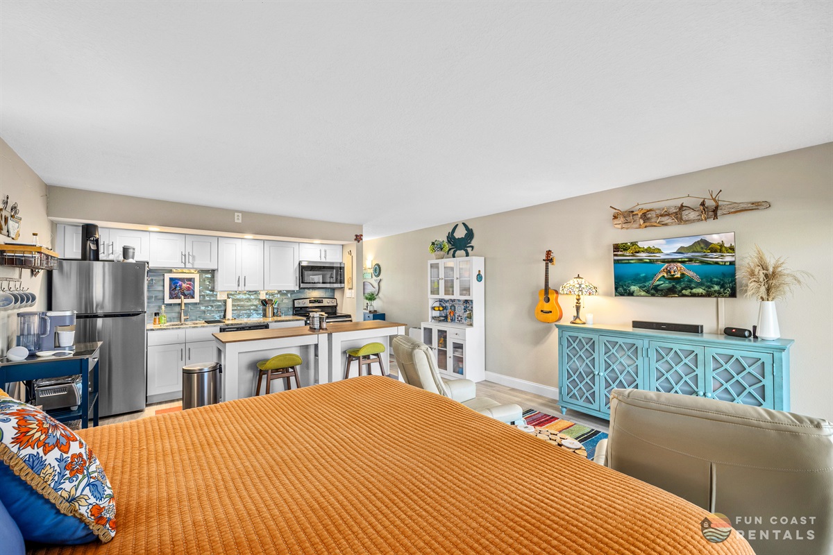 King Bed and Living Room Area