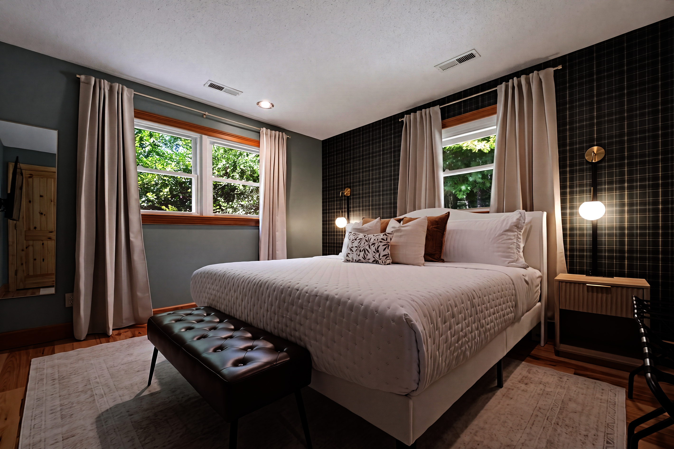 {Bedroom 1} Relax in your own mountain cabin retreat with luxe King bedding, blackout curtains, and your own TV for cozy nights in. 