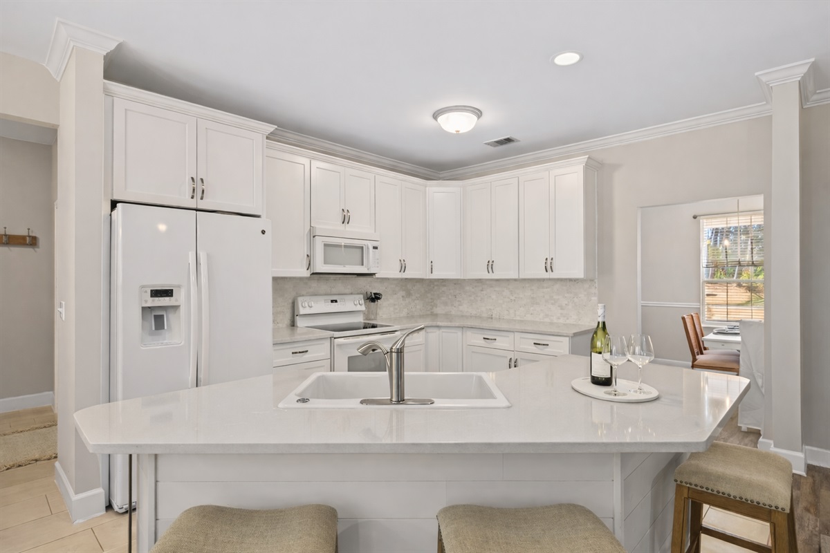 Bright, open kitchen—perfect for slow breakfasts, beach snacks, and wine nights. Guest Review, “Clean, comfortable, and felt like home the moment we arrived.”