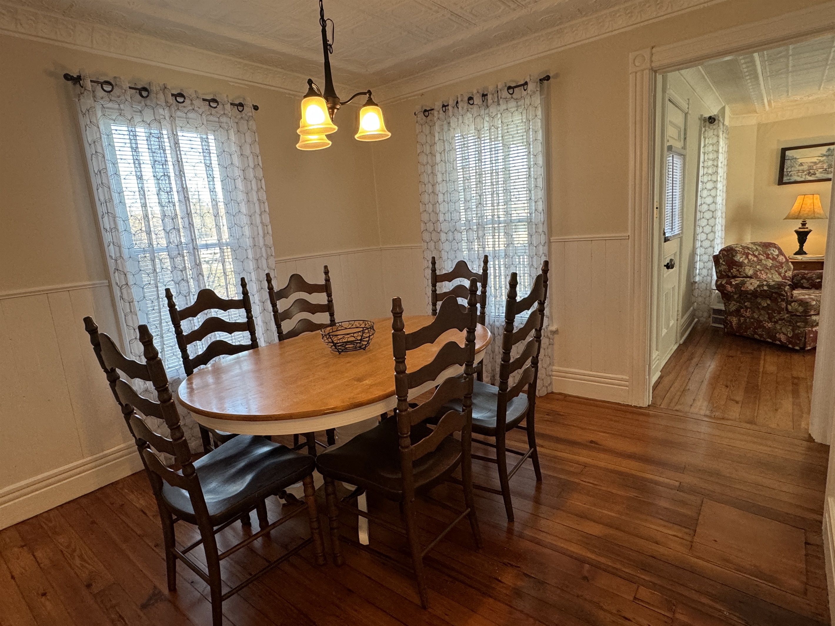 Cooperstown Cottage dining room with beautiful hardwood floors.