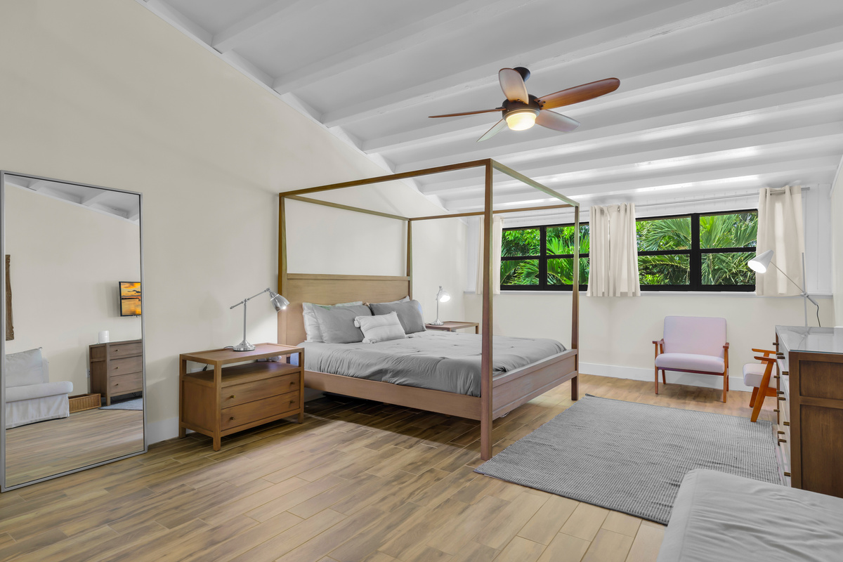 Large primary bedroom with king bed