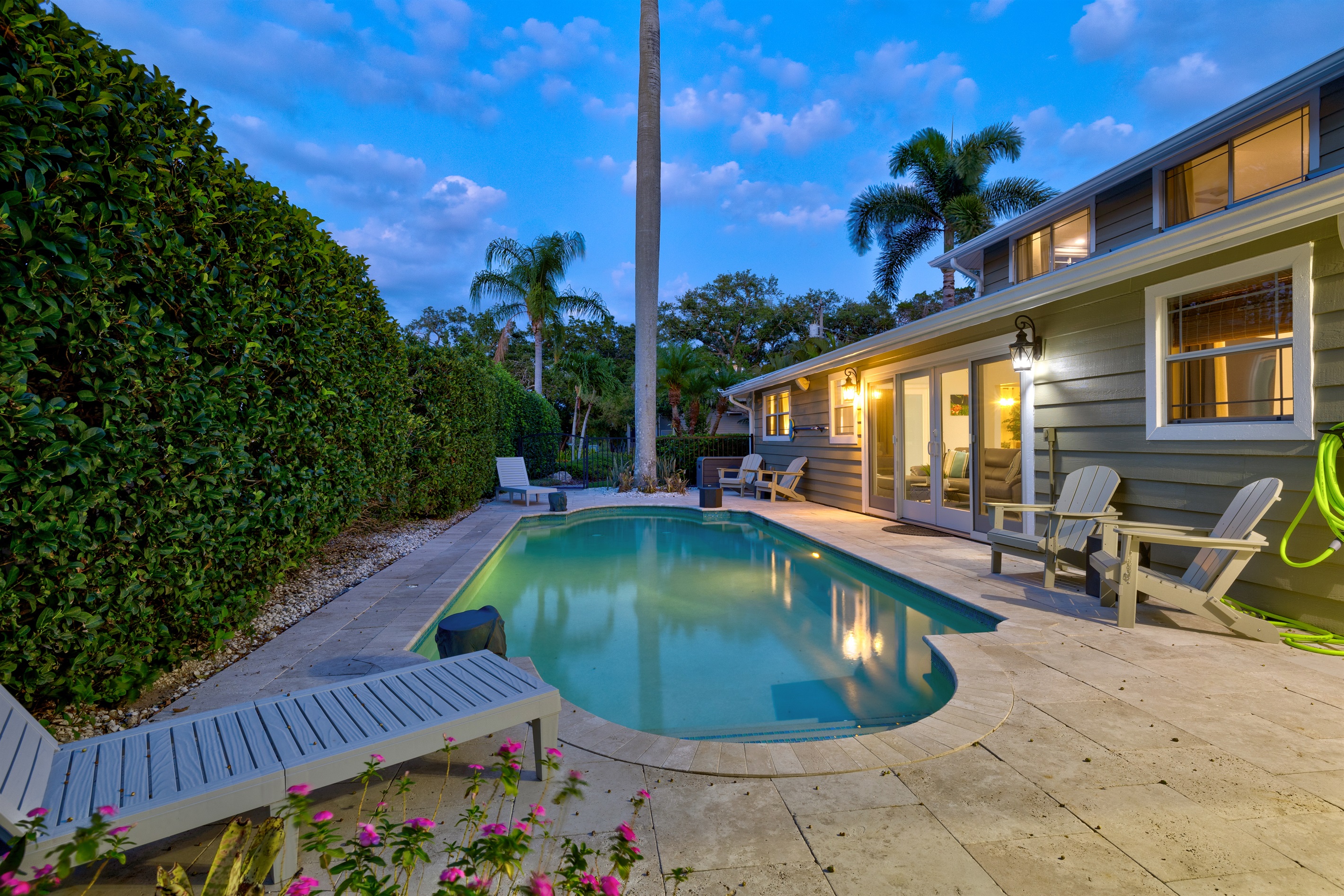 Relax by the private pool, complete with a sunshade for all-day comfort, secure fencing for peace of mind, and seamless indoor-outdoor flow through sliding doors.