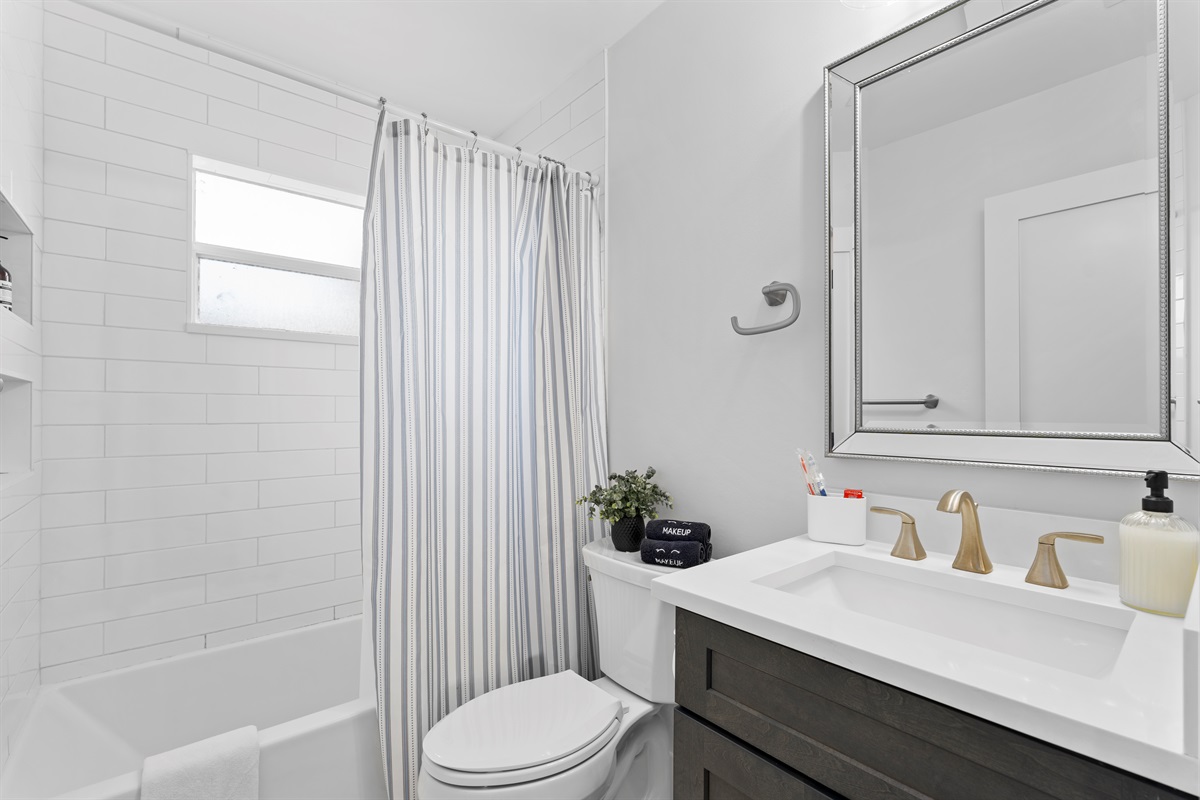 Clean, crisp, and beautifully designed — this guest bathroom combines modern elegance with everyday comfort.