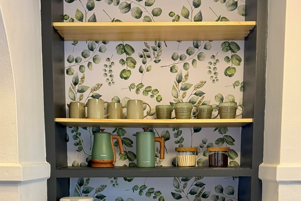 Dedicated coffee station for with coffee and tea provided.