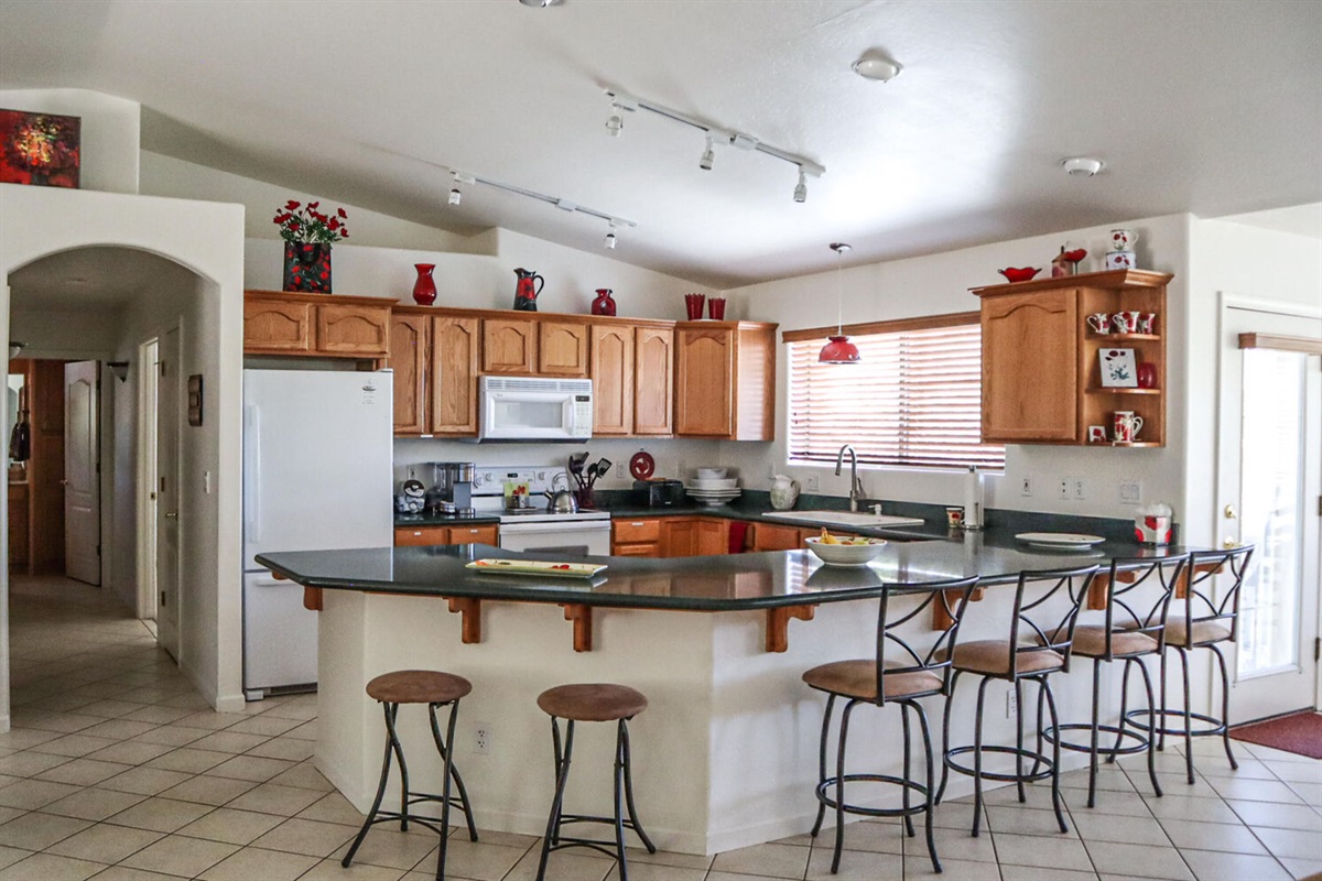Open concept kitchen with plenty of space for homemade cooking.