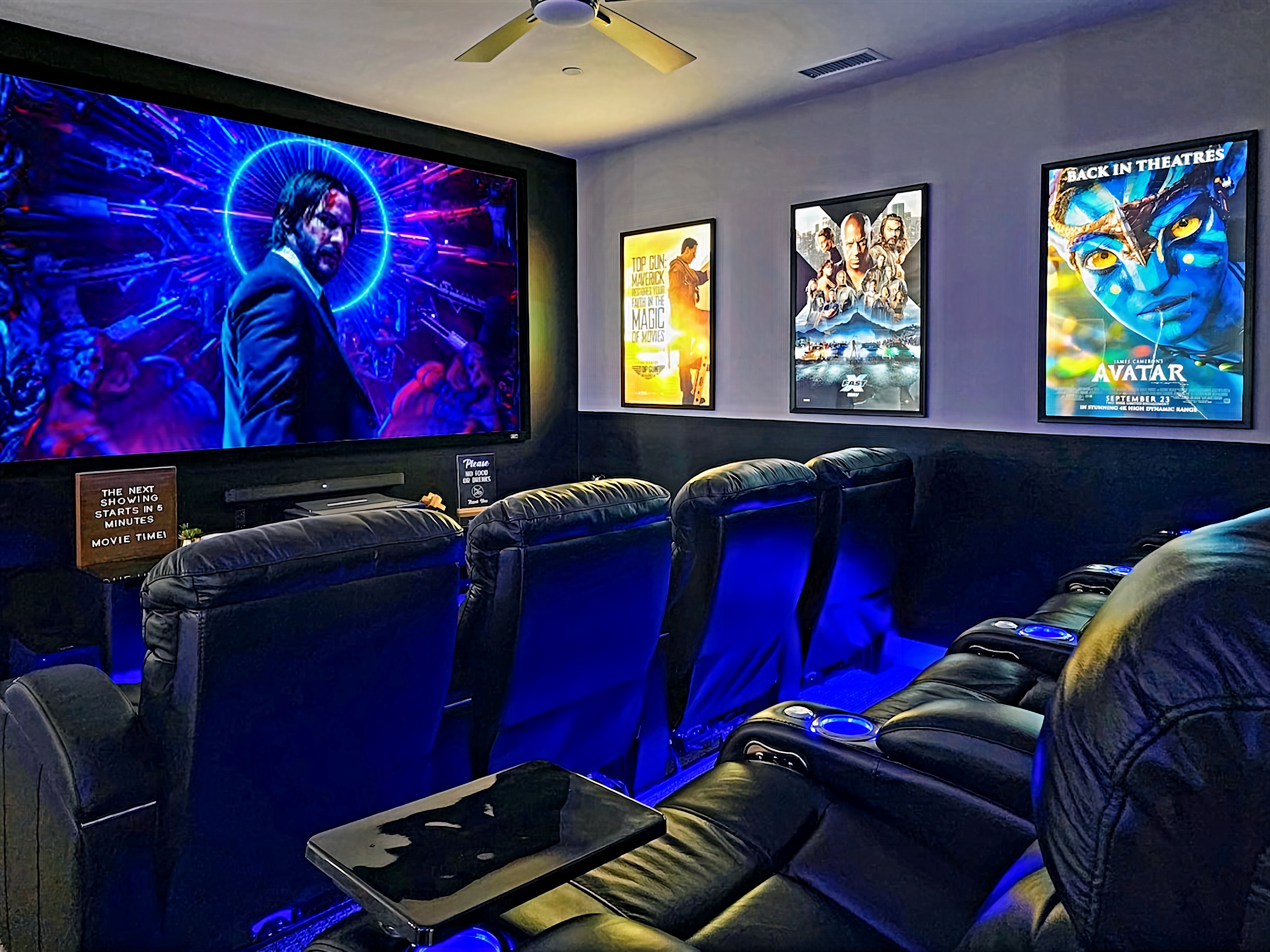 Movie Room: Immerse yourself in cinematic magic with a massive screen and luxury reclining seats!