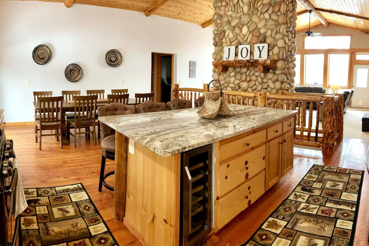 Open floor plan from kitchen and dining to the living room. Gorgeous natural light and lots of space.