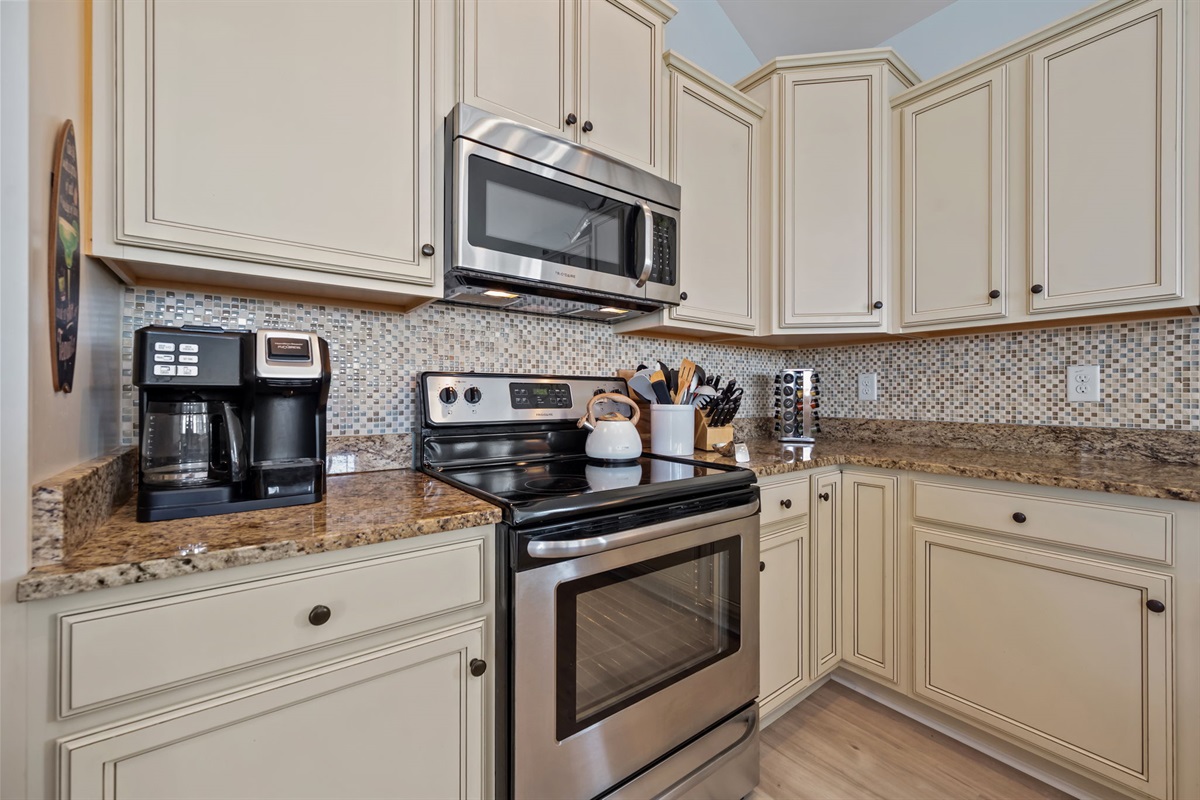 Channel your inner chef in this updated kitchen, featuring modern stainless appliances and all the essentials