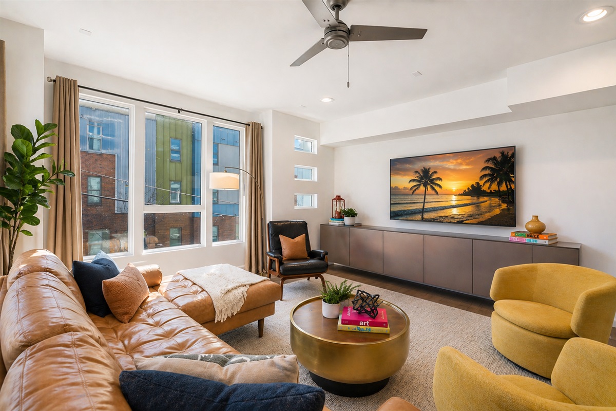 The well-appointed living room has plenty of seating for the entire group. Gather for a conversation, evening cocktail, or intimate movie night. 
