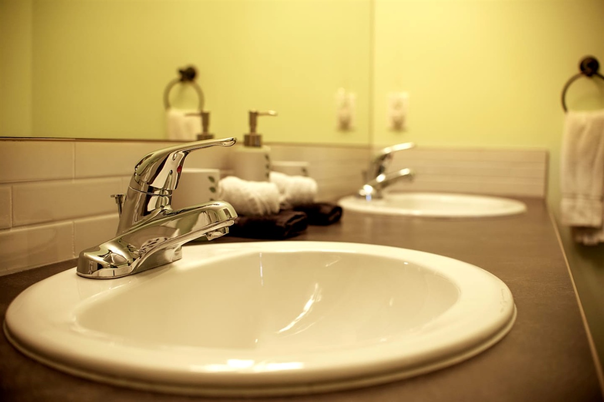 His and hers sinks, heated floor in bathrooms.