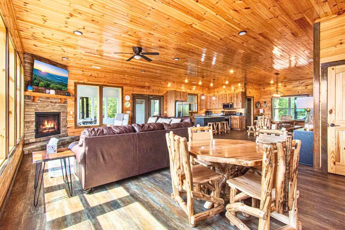 Open Concept Floor Plan on the Main Level Throughout the Living Room, Dining Area and Kitchen
