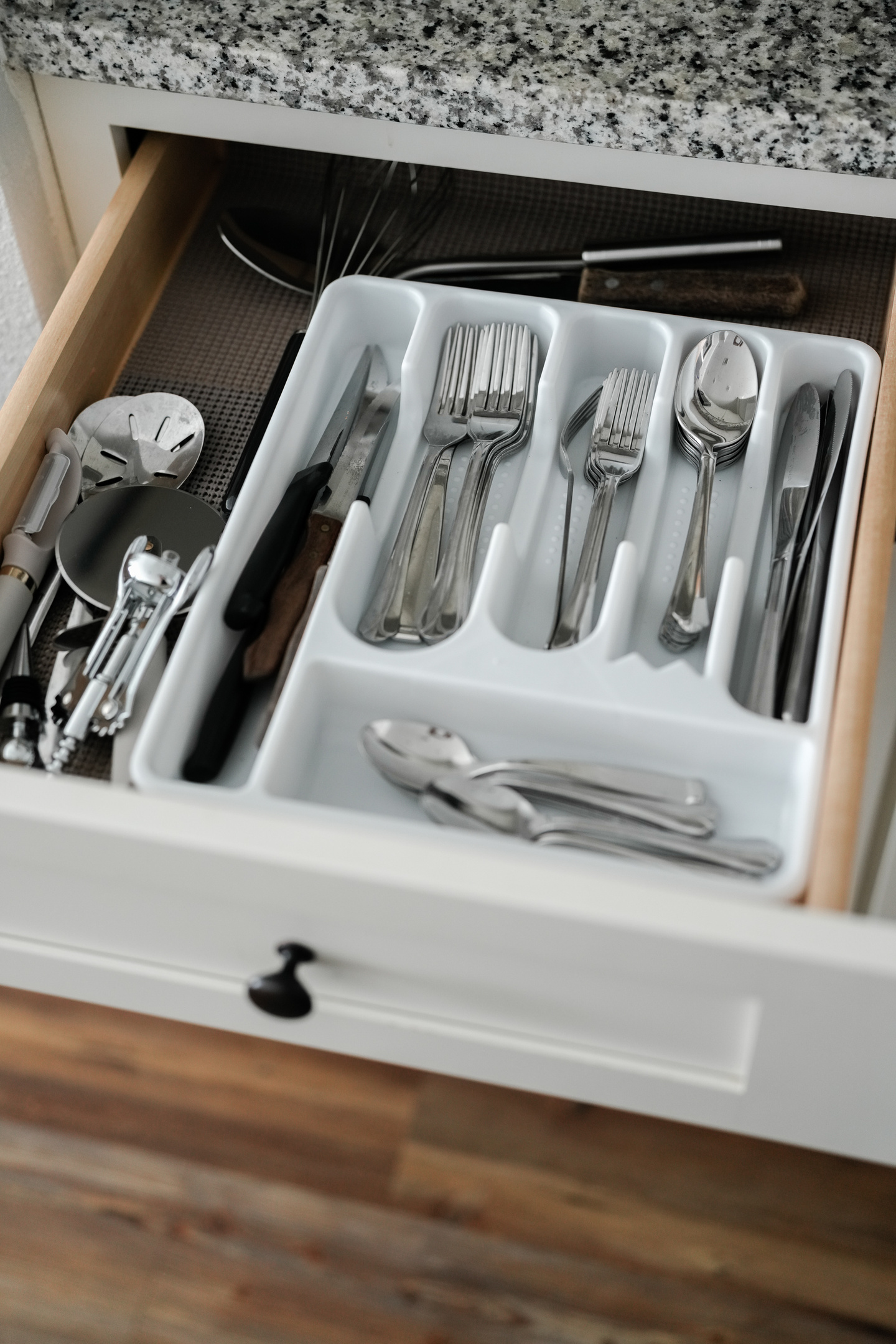 Thoughtfully stocked kitchen featuring cutleries set. Prepare and enjoy meals with these convenient kitchen essentials