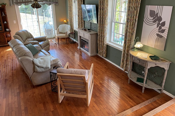 Living room seating area, fireplace & TV