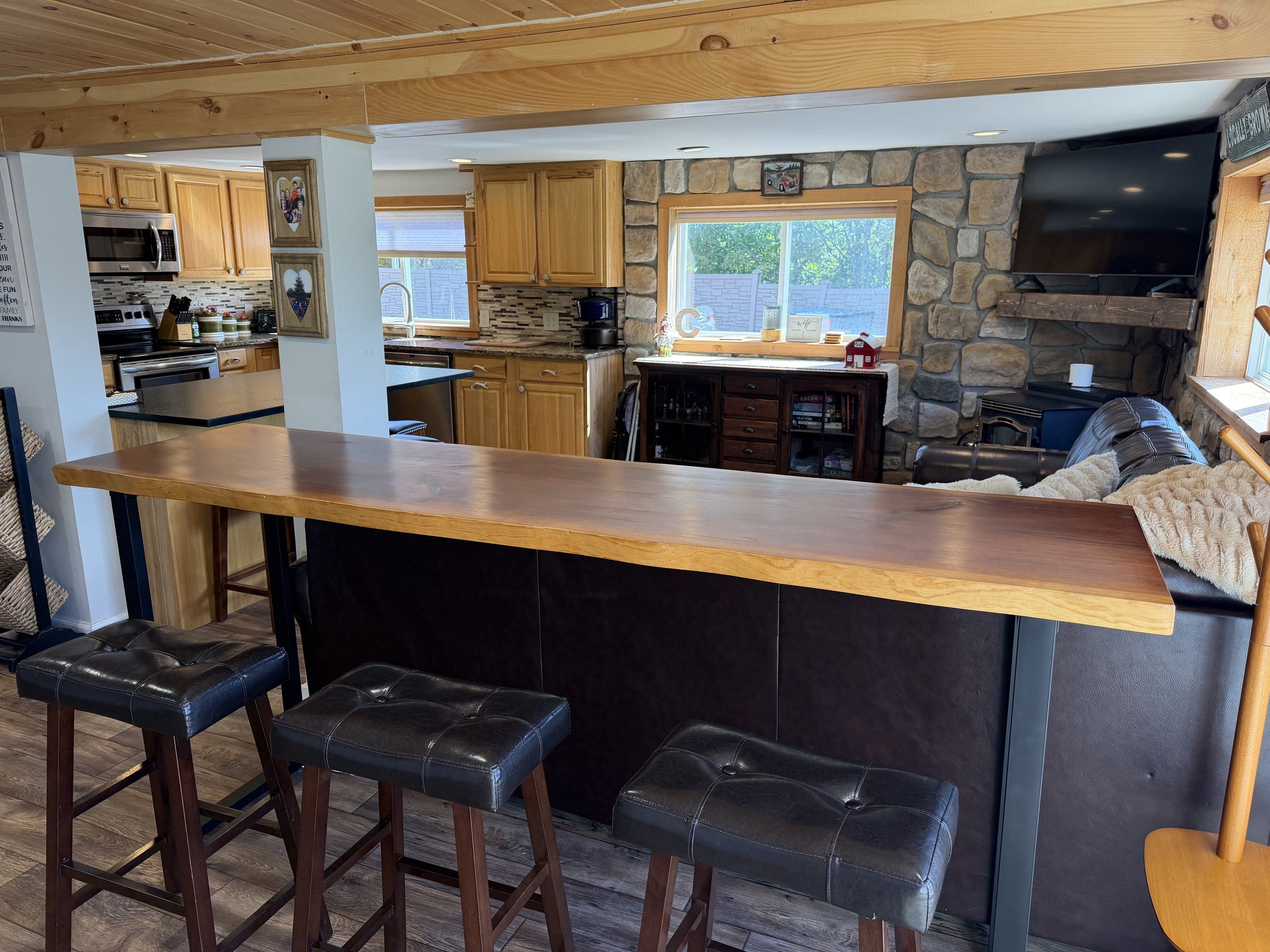 Bar seating behind the couch for snacking and cheering on your team