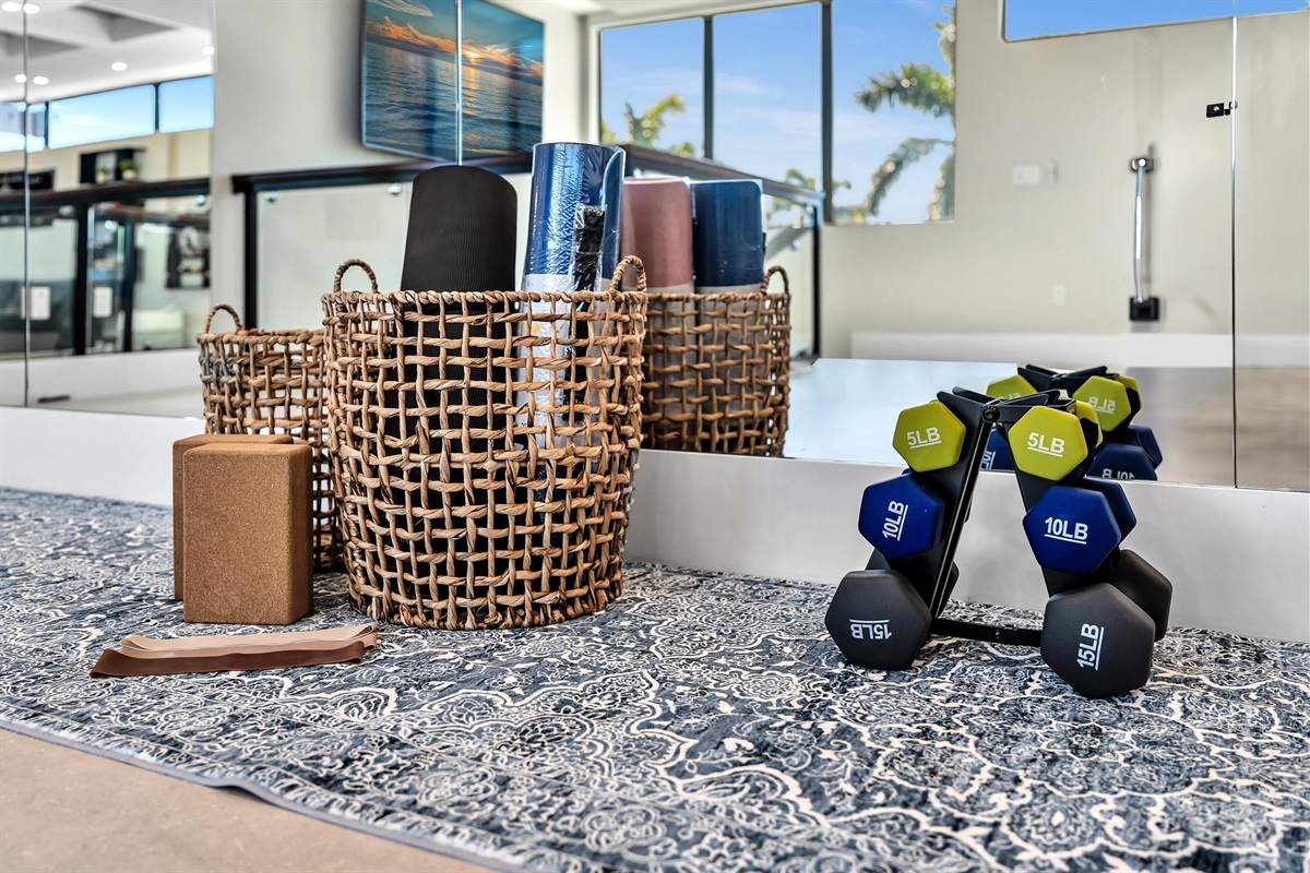 Fitness-friendly space with dumbbells and yoga mats for light workouts during your stay.