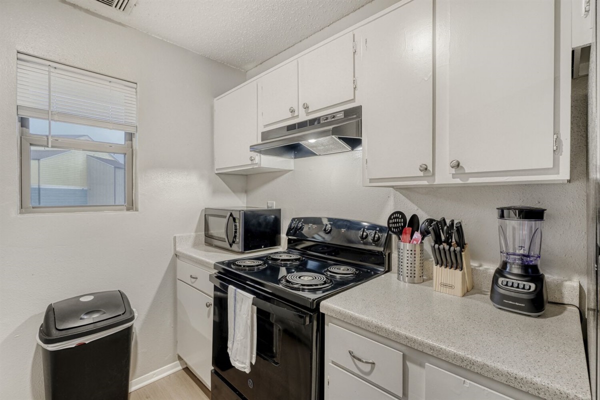 Compact kitchen with modern essentials and a clean, functional design.